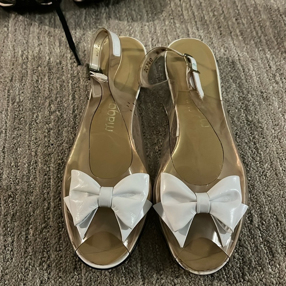 NWOT Vintage clear flats with white leather bows